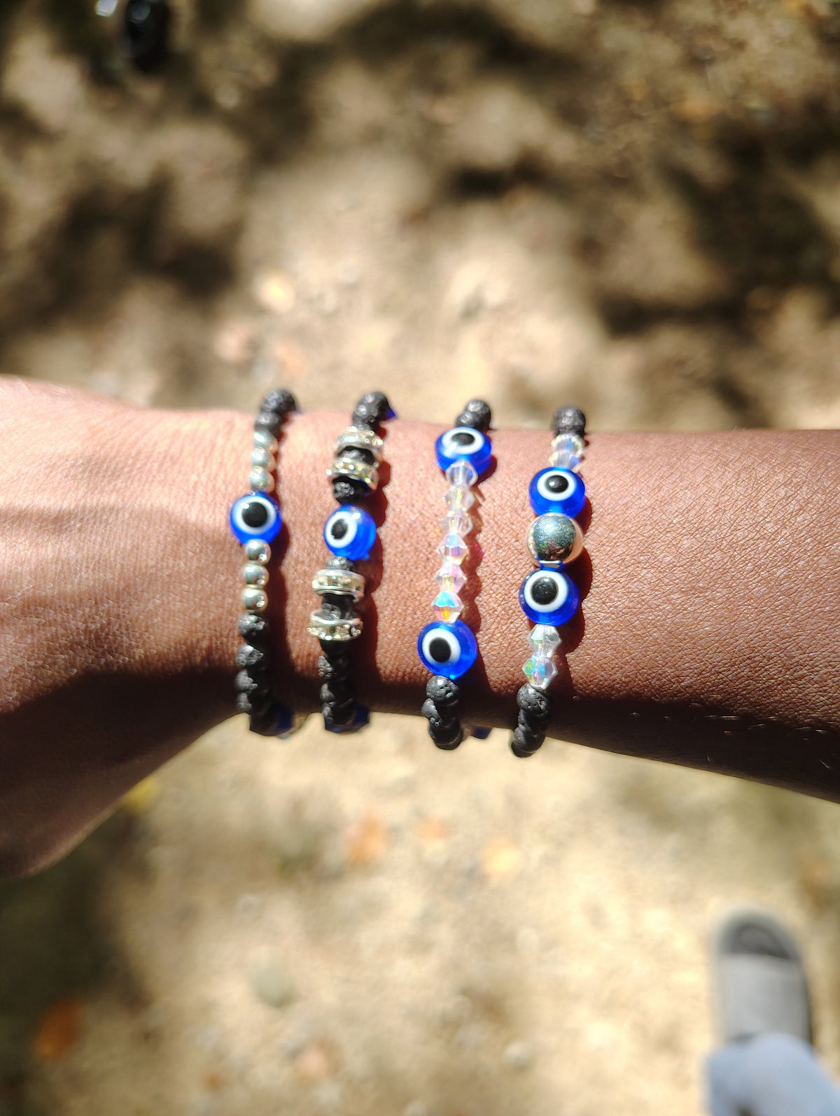 Crystal Eyes bracelets collection on wrist